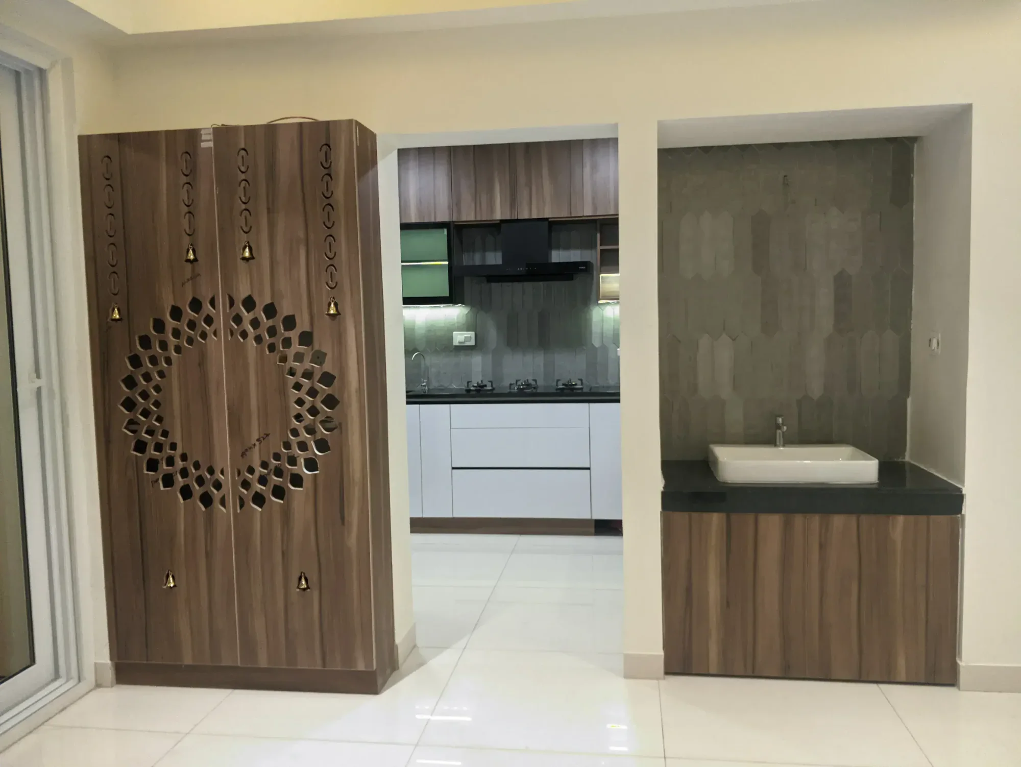 Decorative timber screen and storage completed by Trifold, Chennai